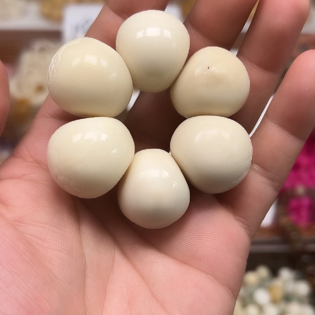菩提根/象牙果手串手捻一个表情的有大裂