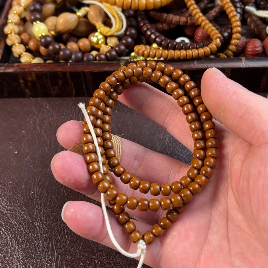 这***友吊坠星月菩提Z110紫金鼠长串6×5