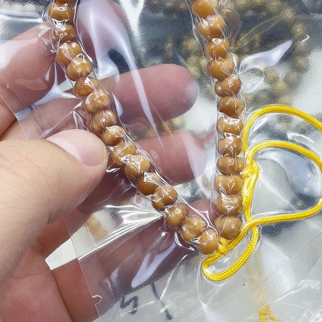 龙脊菩提手串37深龙脊菩提雕刻屁桃小手持对角7.5左右