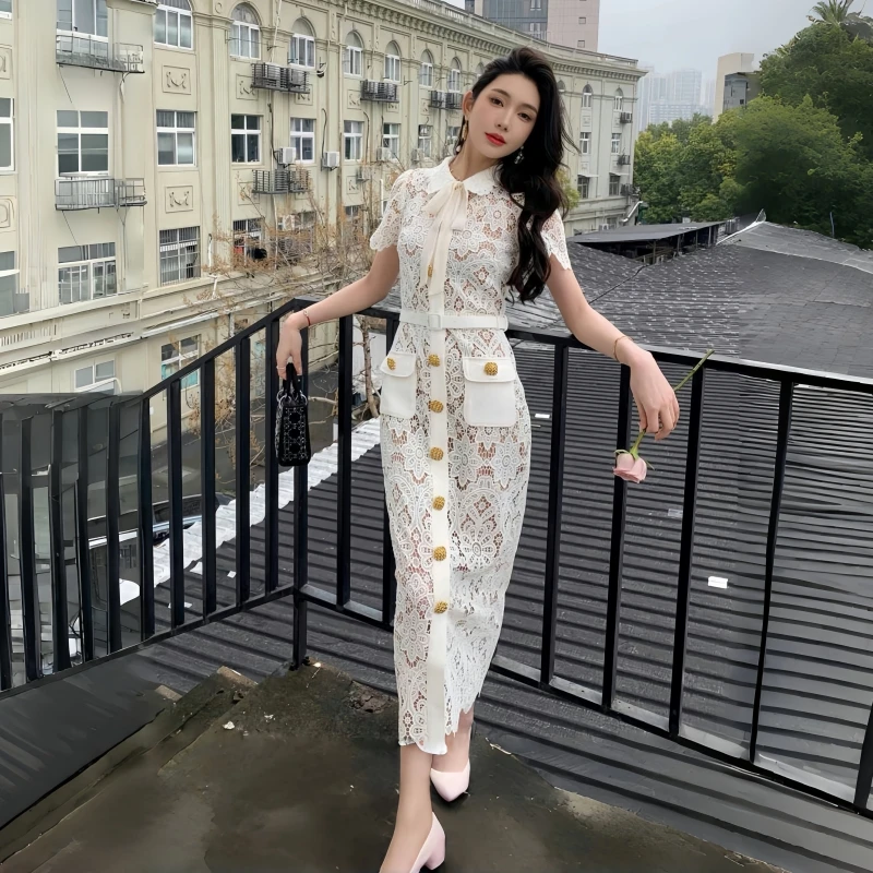 白色蕾丝鱼尾连衣裙显瘦气质单排扣法式复古夏季名媛白色连衣裙女