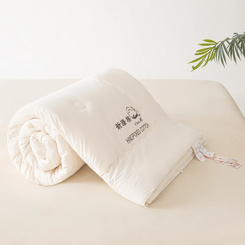 新疆长绒棉花被单人双人亲肤透气保暖四季被加厚冬被