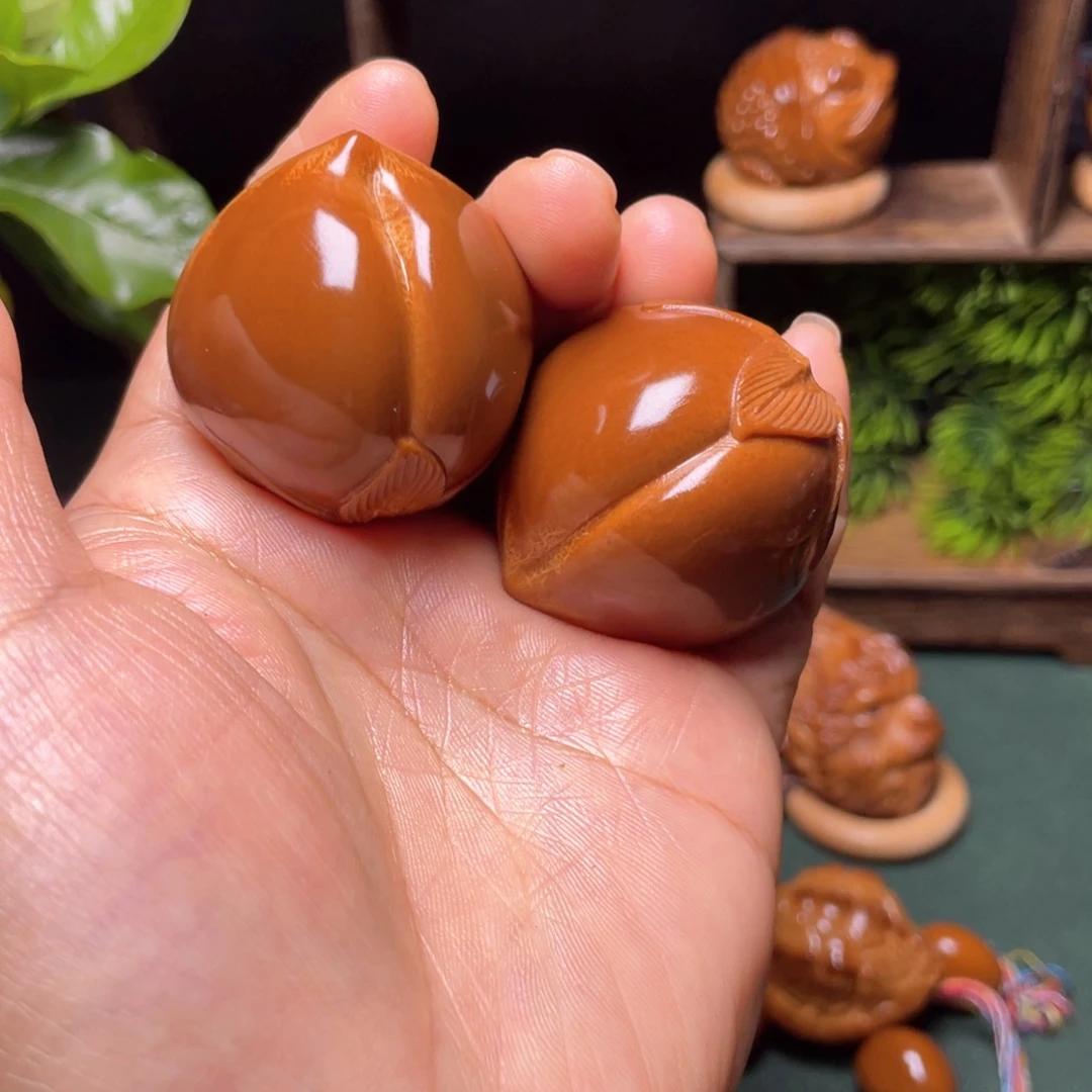 把件橄榄核寿桃37一对