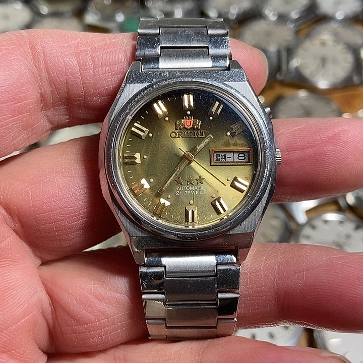 小狮子彩盘机械手表