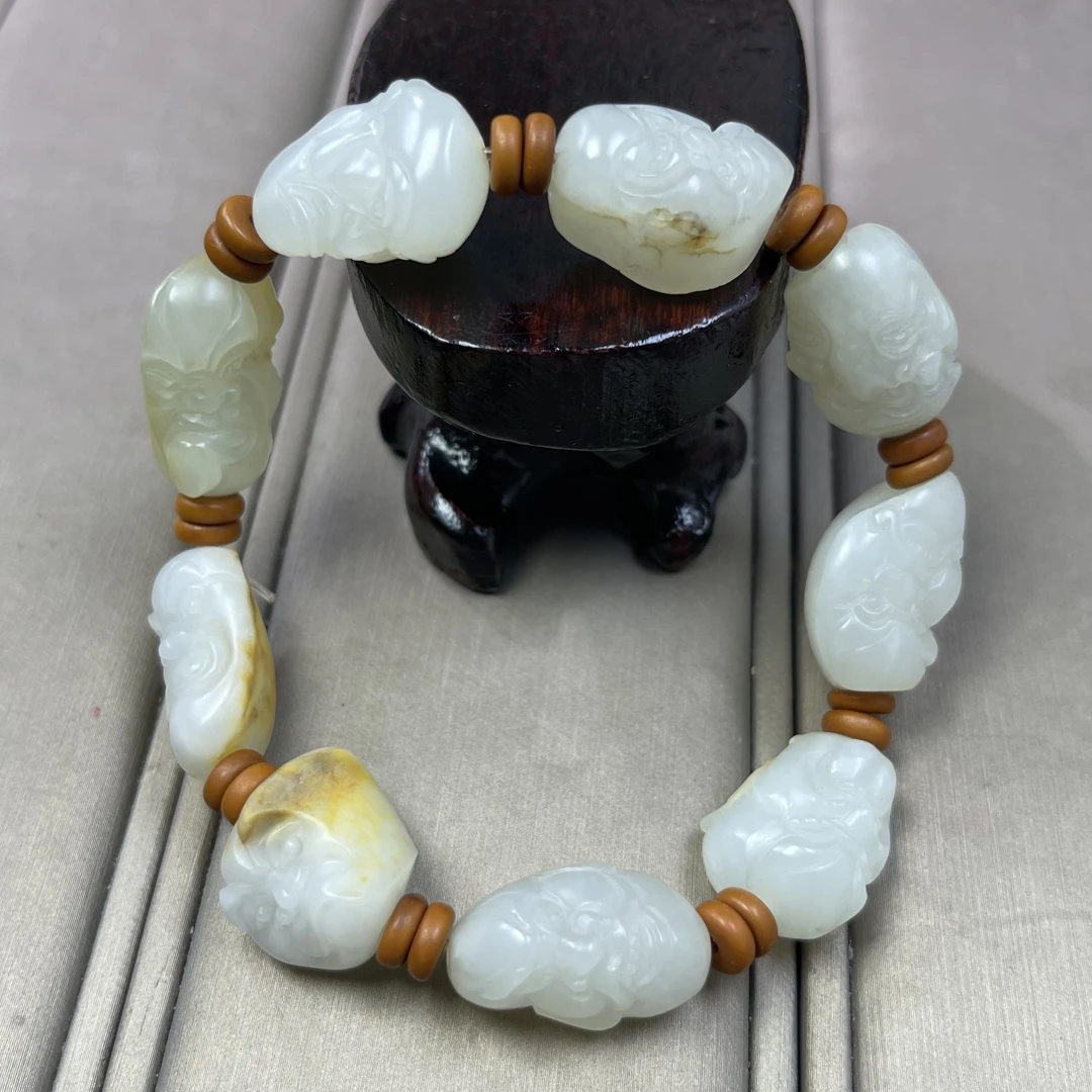 天然和田玉新疆白玉十八罗汉手串精工雕刻细腻金皮籽一物一证