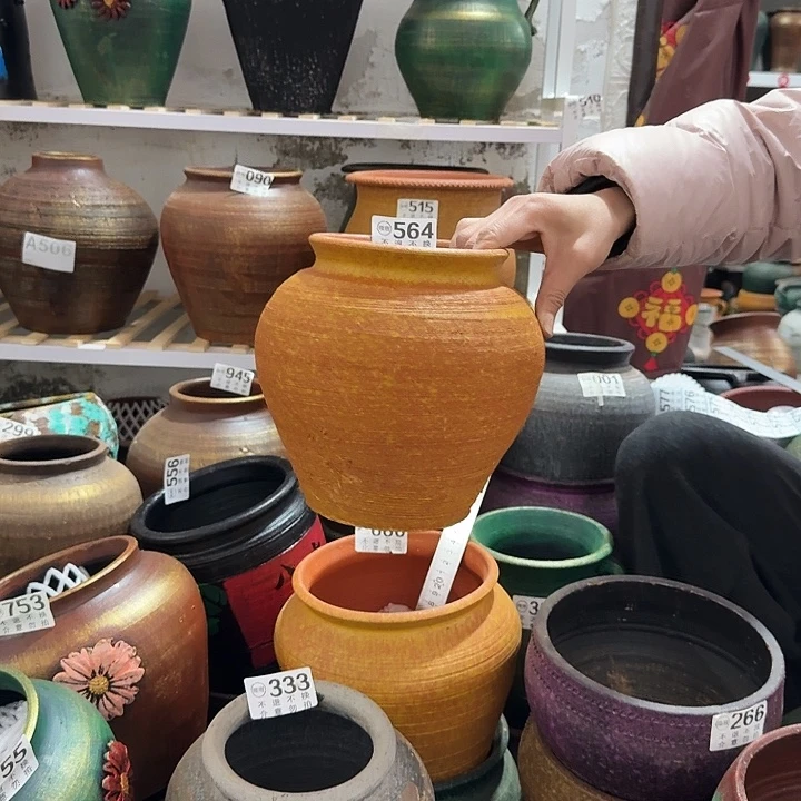 瑕疵黄色坛子564高度20口径14