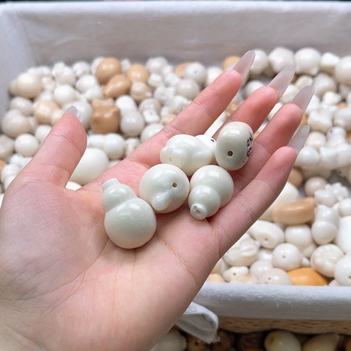 白玉菩提吊坠b16mm/5颗白色牙牙果瑕
