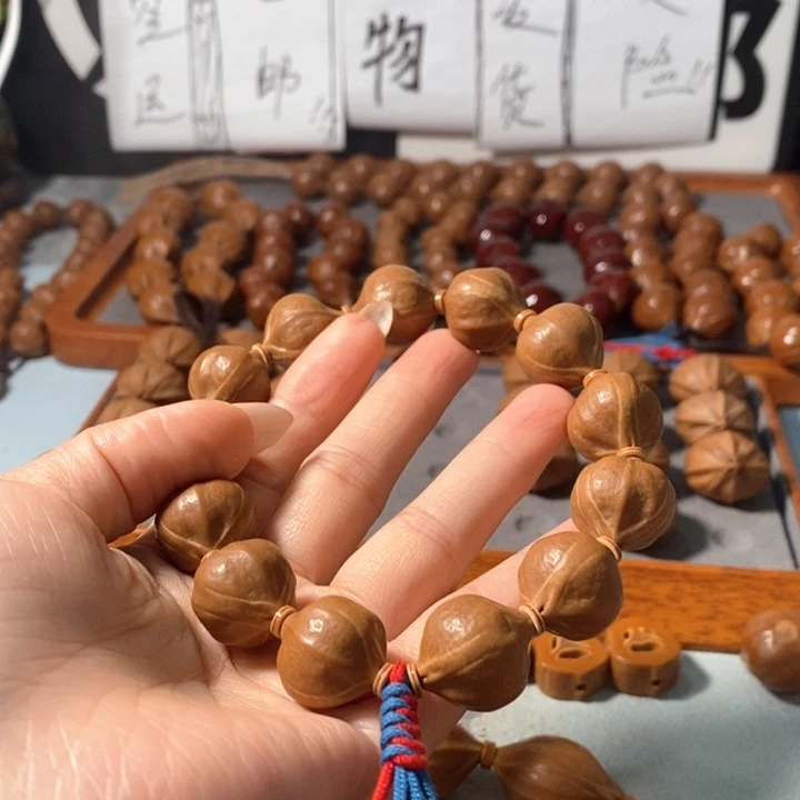 逍***世手串橄榄核8171精品蒜头铁核12+1颗