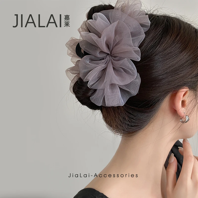 气质高档蓬松云朵泡泡抓夹女 2025新款大号蝴蝶结盘发鲨鱼夹发夹