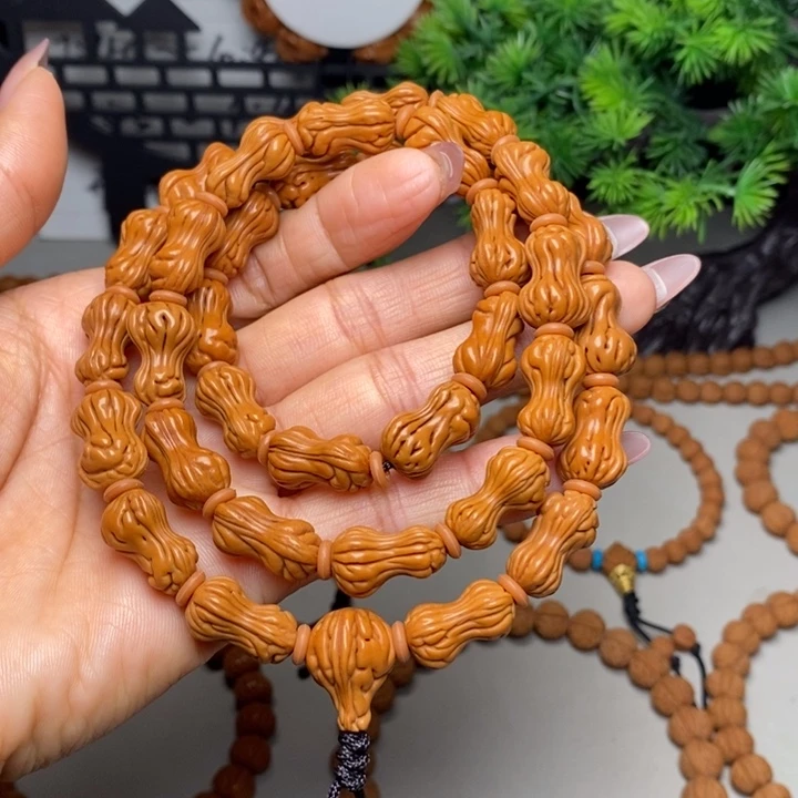 桃核手串花生脖挂