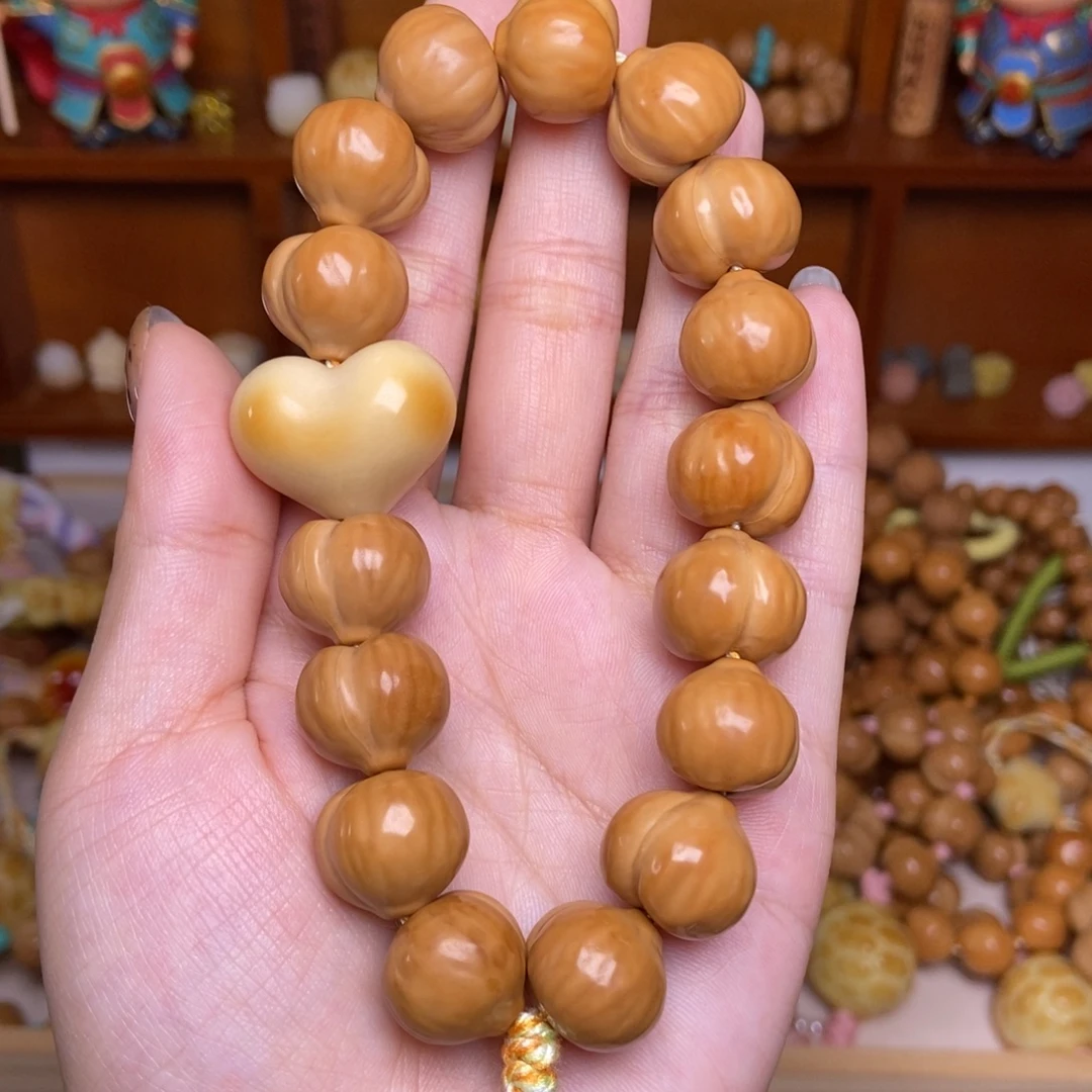 吊坠猴头核桃爱心屁桃手持