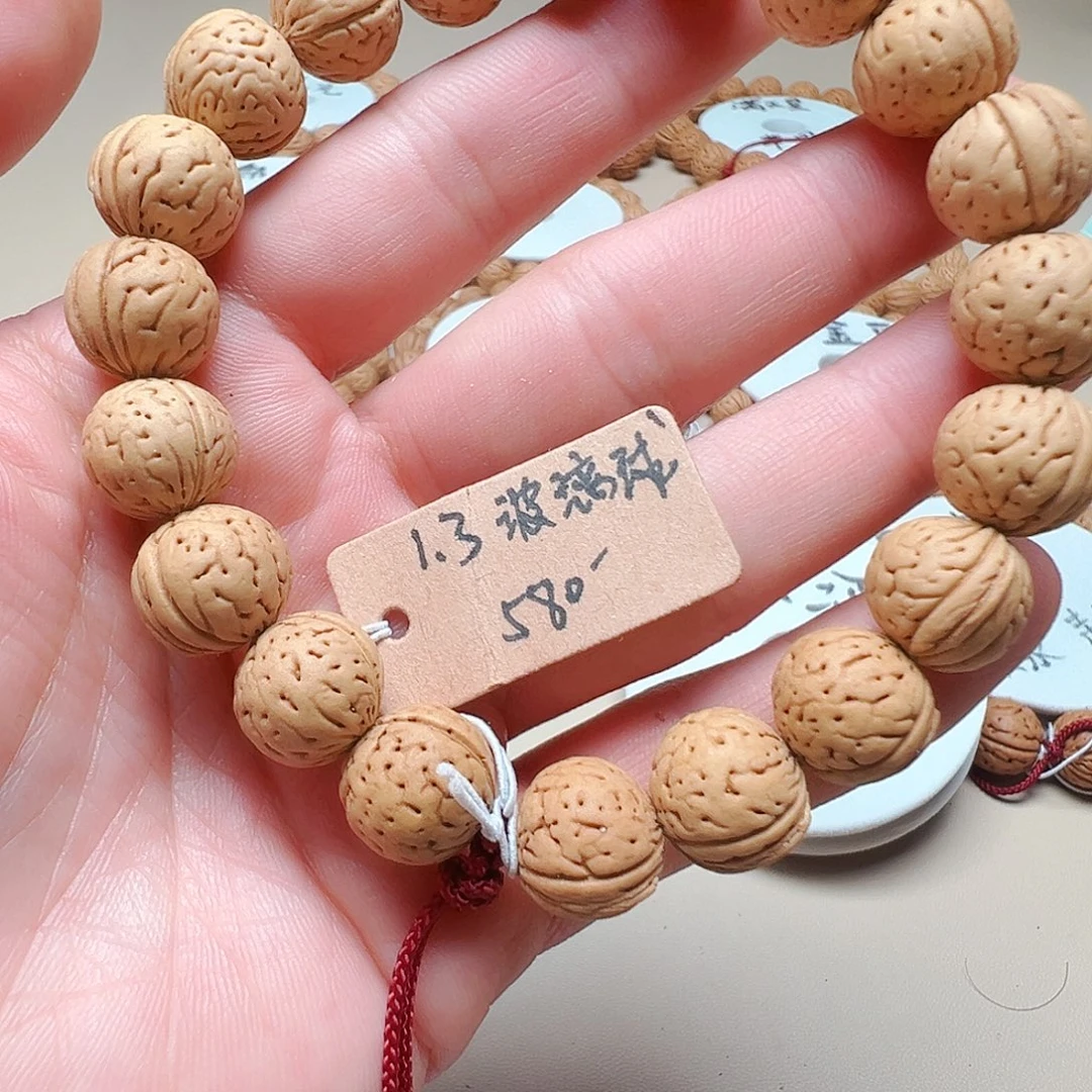 ****男桃核手串1.3玻璃球