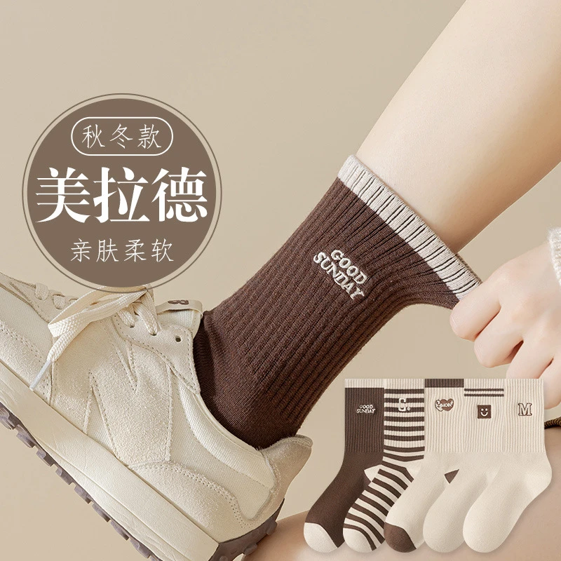 秋冬款新款美拉德咖色系笑脸女袜条纹中筒袜潮流运动长袜诸暨袜子