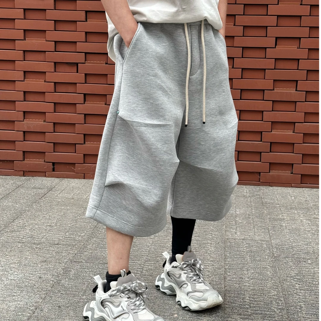 夏季宽松阔版直筒美式褶皱时尚百搭高街港风瘩帅松紧腰休闲7分裤