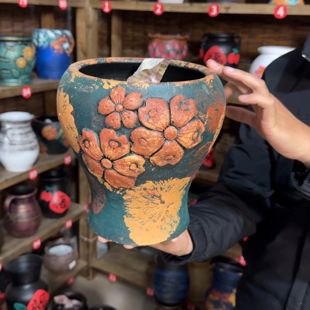 有孔红陶浮雕花盆炸炸炸