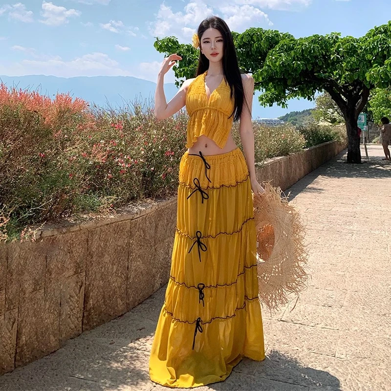 泰国海边多巴胺度假穿搭女夏季海岛氛围感透视挂脖背心半身裙套装