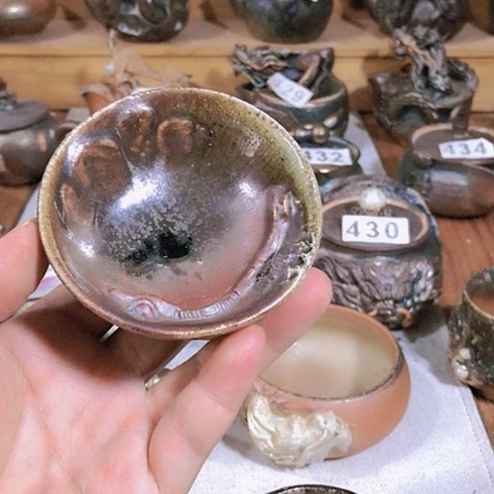 瓷片微瑕的风景杯子