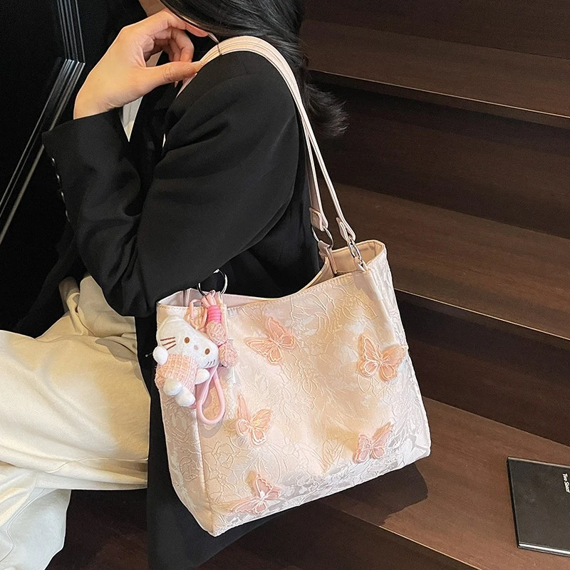 甜美温柔少女蝴蝶单肩包2025新款大容量通勤女包大学生上课托特包
