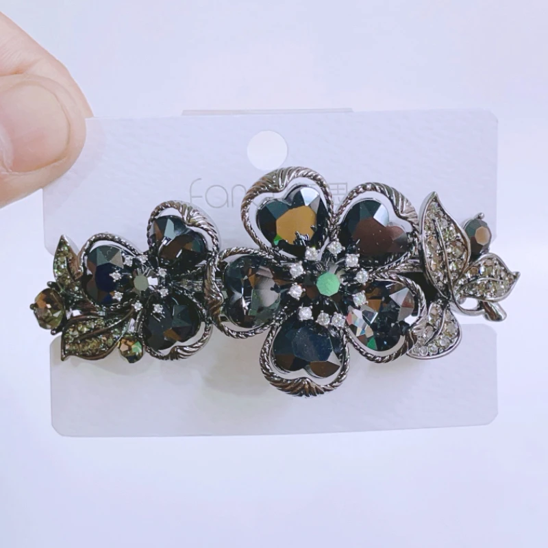 高档轻奢发饰2024新款黑色水晶花朵发夹后脑勺弹簧夹子成人发卡