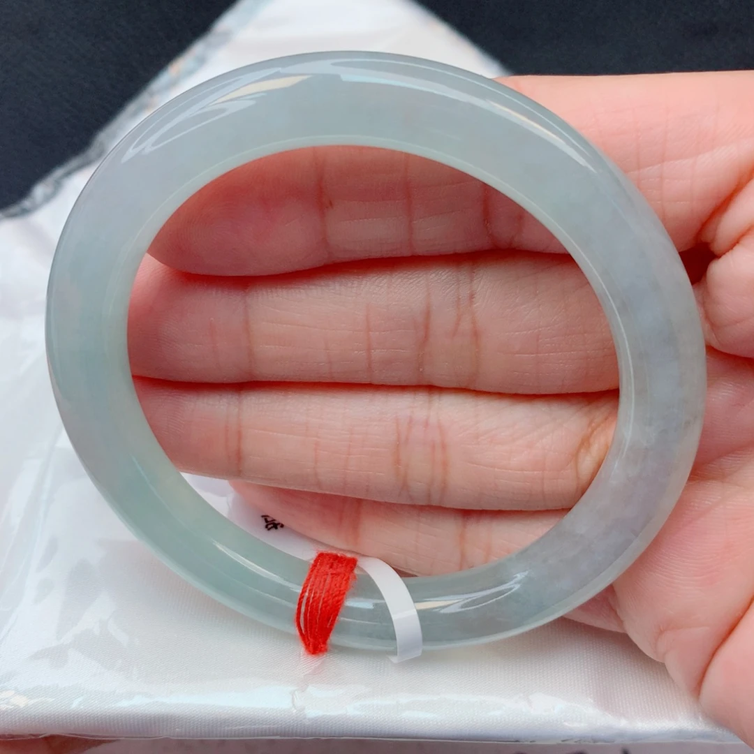 翡翠未镶嵌手镯54圆条 糯冰晴水底有棉纹