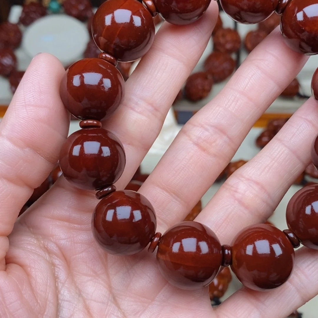 橄榄核吊坠万**意光珠，