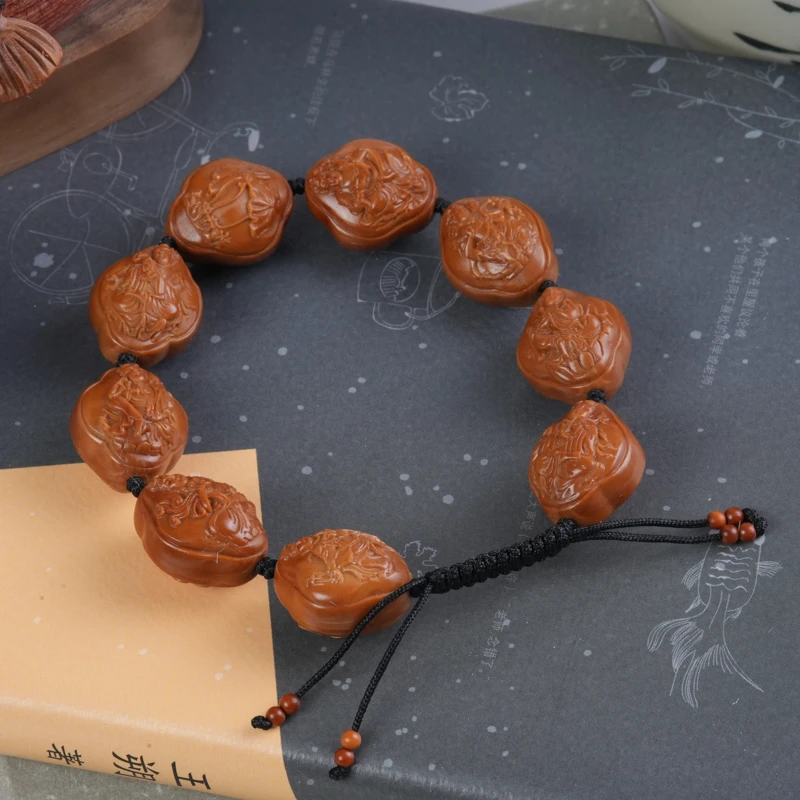 四叶草八大观音橄榄核雕刻手串