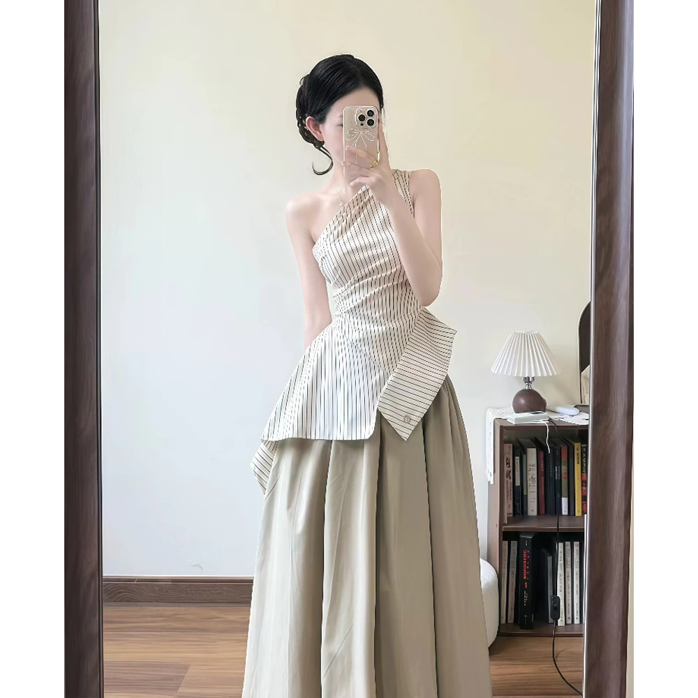 夏季高级感简约不规则斜肩条纹吊带上衣女法式高腰A字伞裙两件套