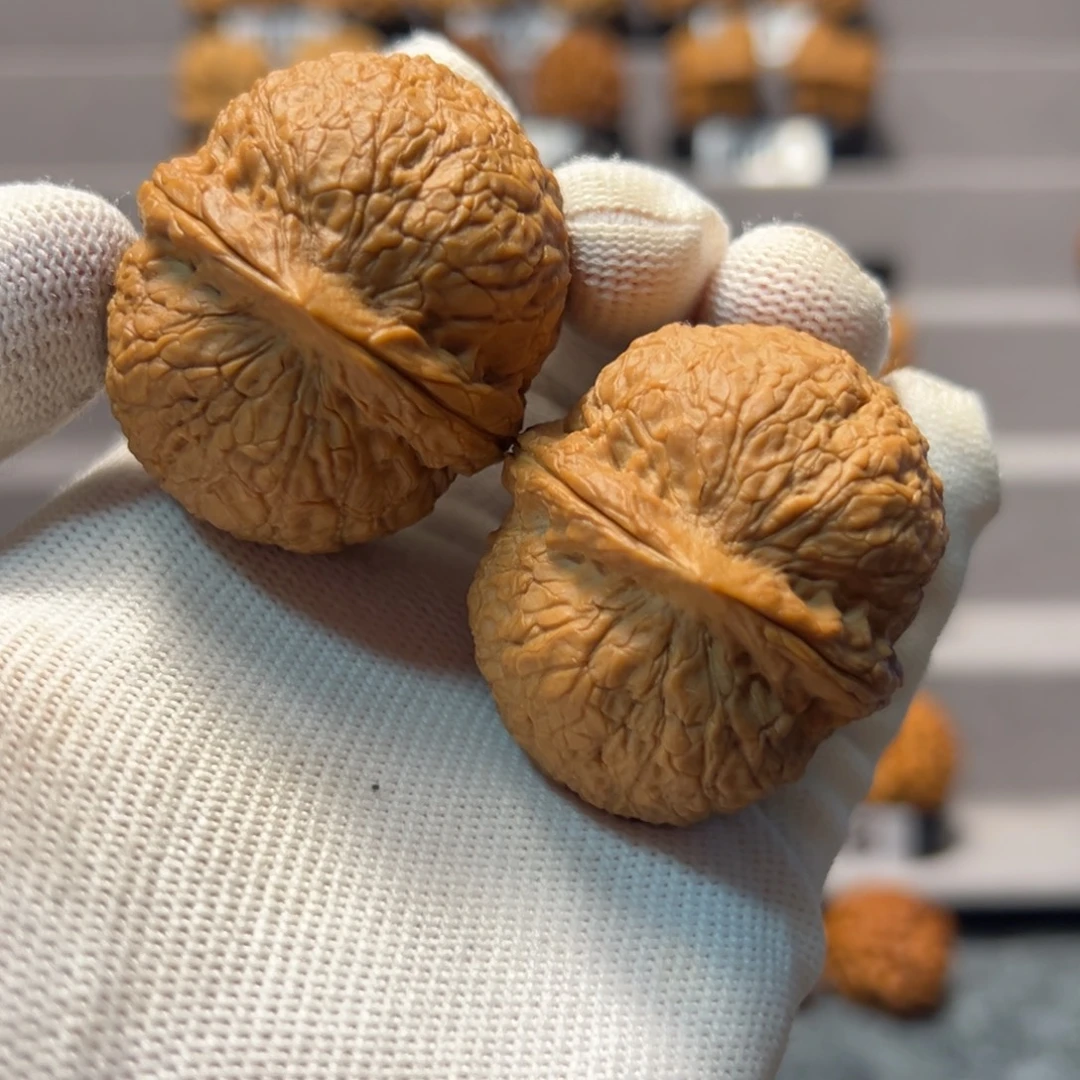 姑***外文玩核桃把件45mm粗筋铁秤砣