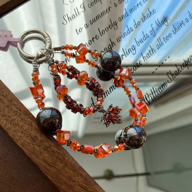 2733橘色挂件小众原创手机链