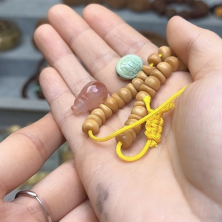 菩提根/象牙果吊坠莉****?龙脊大肠手持