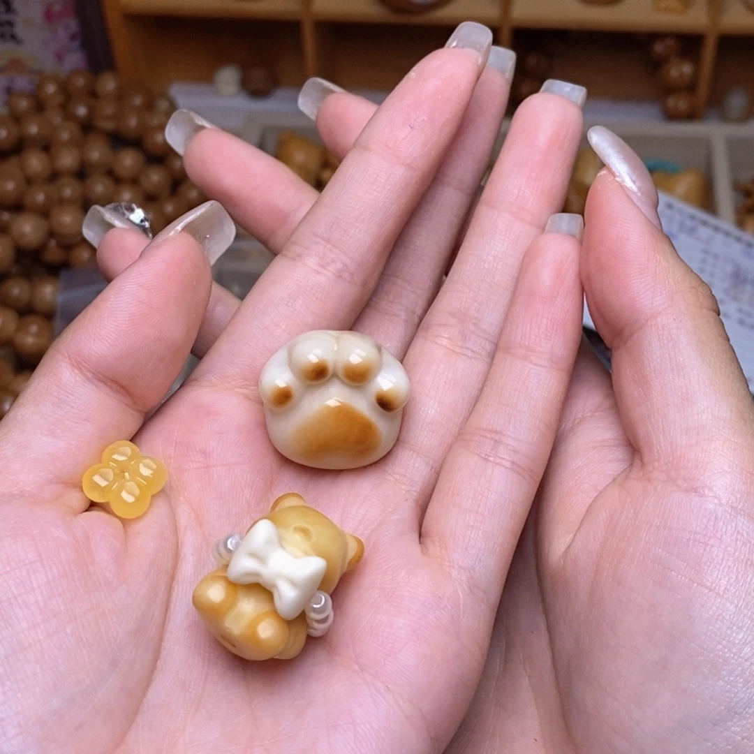 东***儿猴头核桃吊坠0.46小花猫爪熊珍珠蝴蝶结项链焦糖流苏