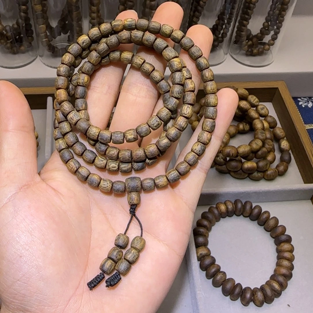 沉香香囊沉香海南乌身白棋沉水浮鼓珠0.6多圈19+