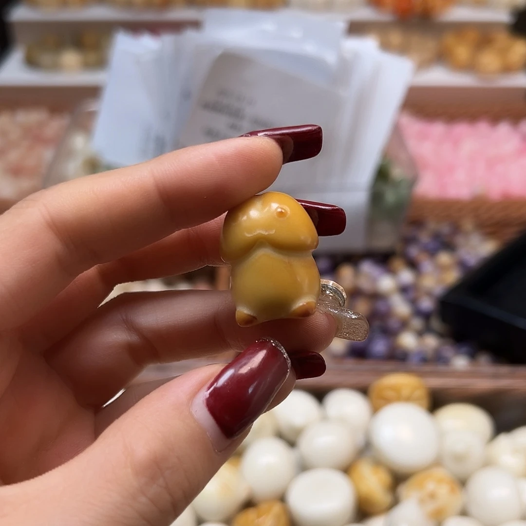 哈***塔手串菩提根/象牙果瑕疵炭烤丁丁1颗有裂
