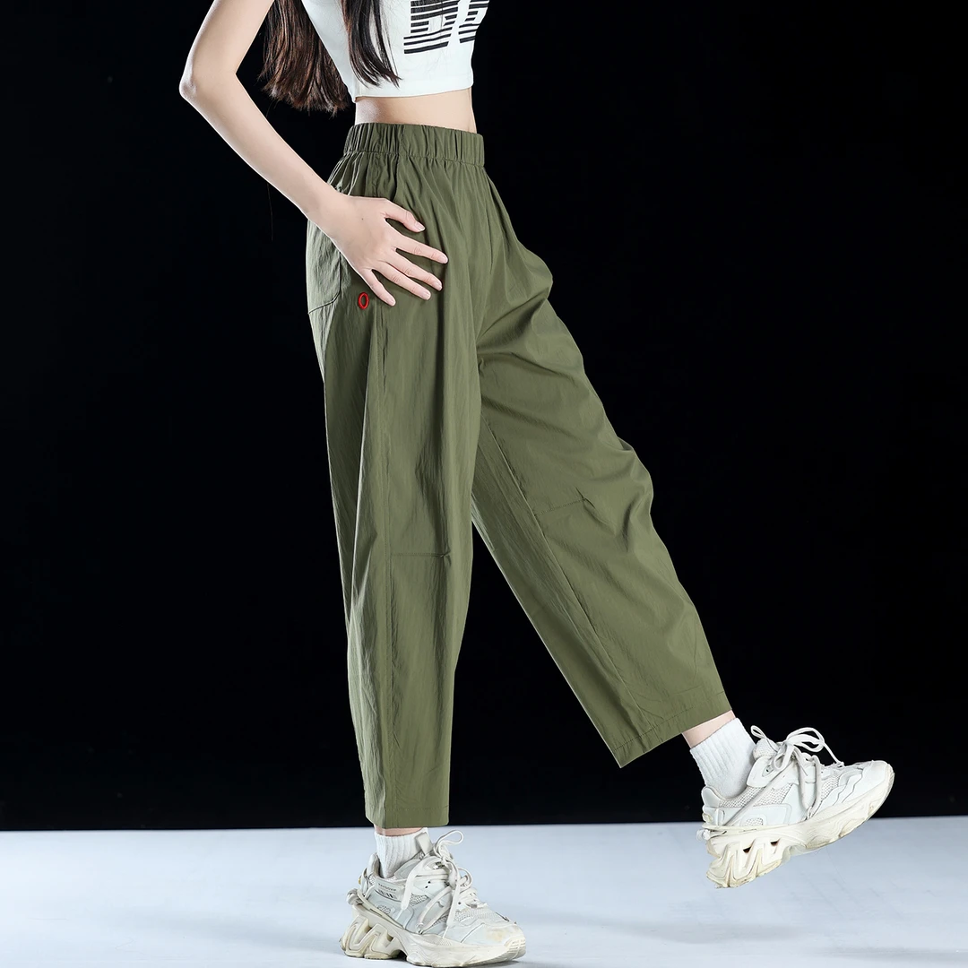 绿色冰丝薄款裤子女士2025新款夏季速干哈伦裤宽松九分老爹萝卜裤