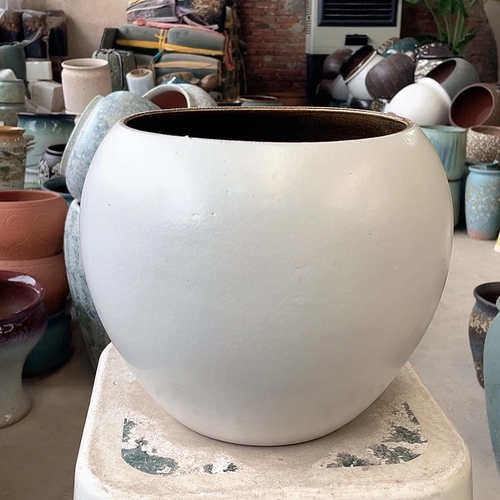 紫砂花盆正品口19高23。z z z z