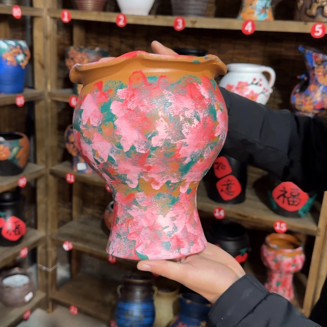 有孔红陶浮雕花盆炸炸炸