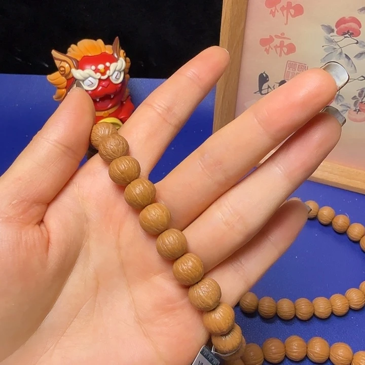 *****猴头核桃手串凤羽