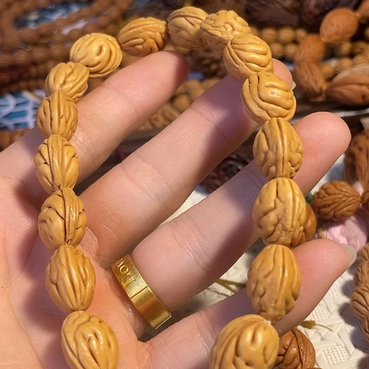 二***巴吊坠桃核碧桃核肌肉纹手持