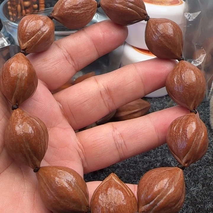 橄榄核手串橄榄核原皮铁盒三面佛