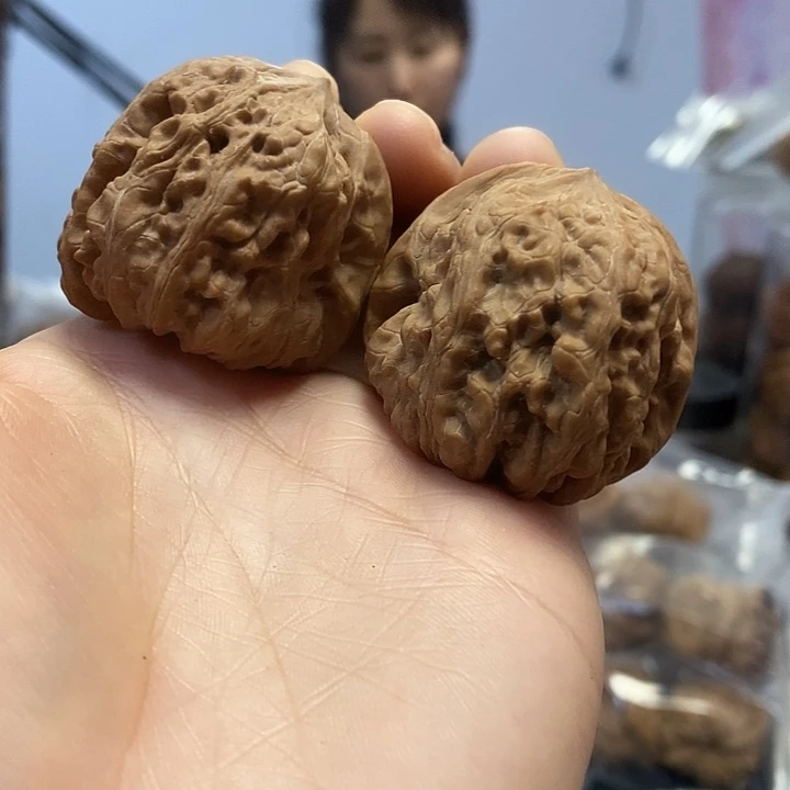 文玩核桃把件40.5平谷凹底红皮练手