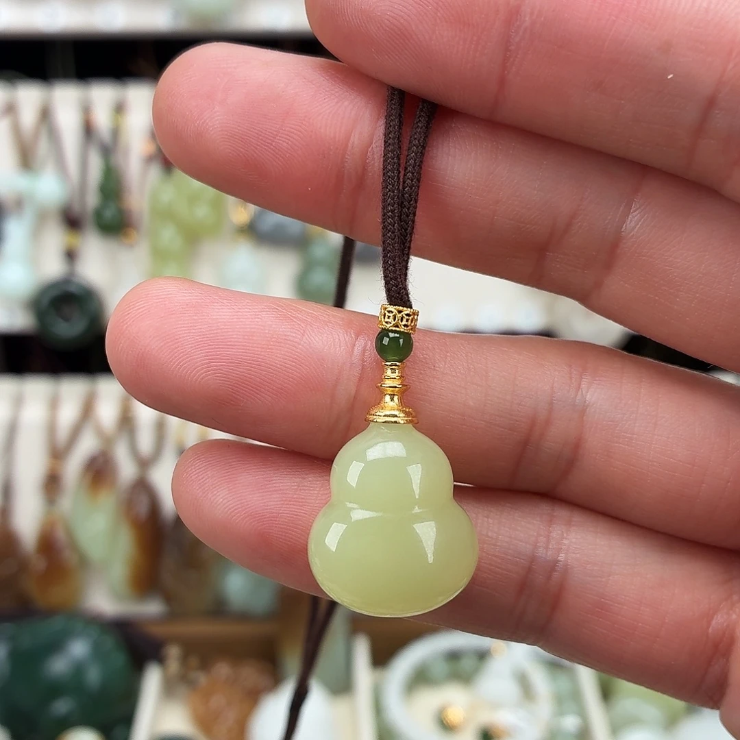 沐****和田玉未镶嵌颈饰天然和田玉黄玉葫芦吊坠