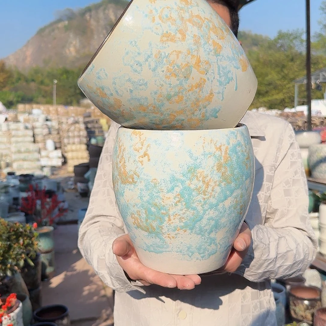 紫砂花盆口18高20.5（两个蛋壳黄色工艺品