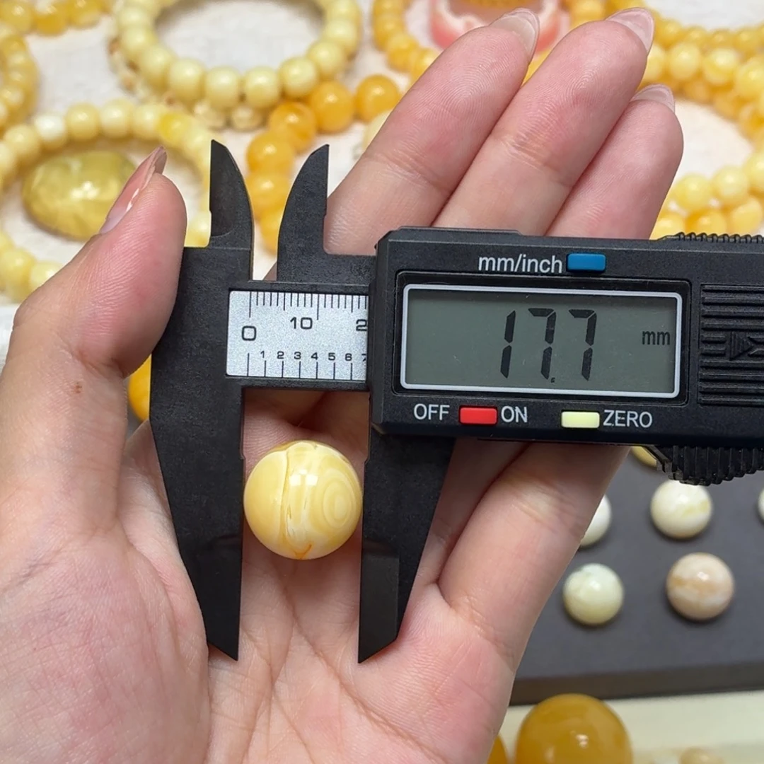 琥珀未镶嵌颈饰乌料奶橘双瞳溶洞单珠17.7mm