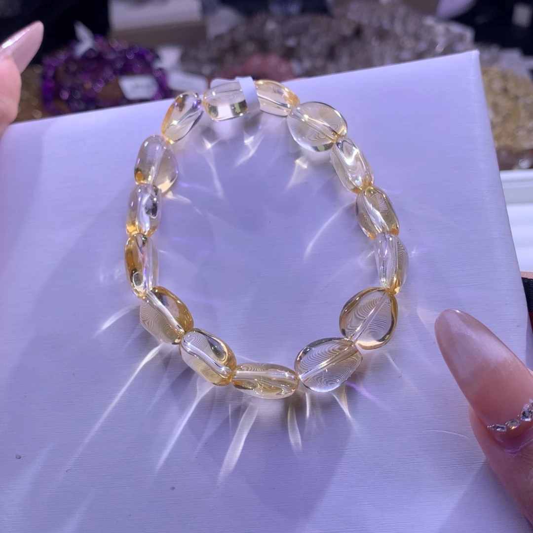 L***达水晶未镶嵌手串黄水糖豆