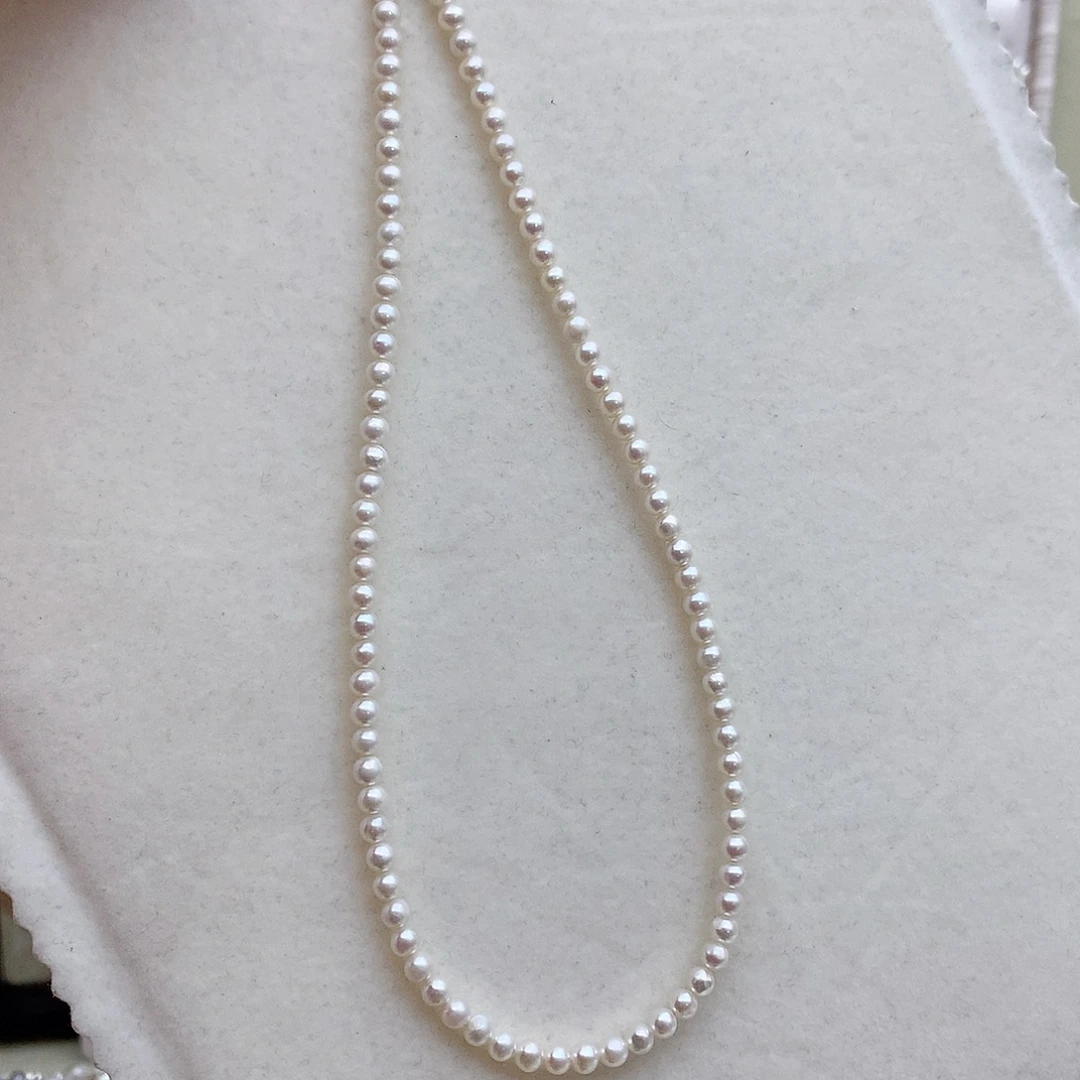 淡水珍珠银S925镶嵌耳饰