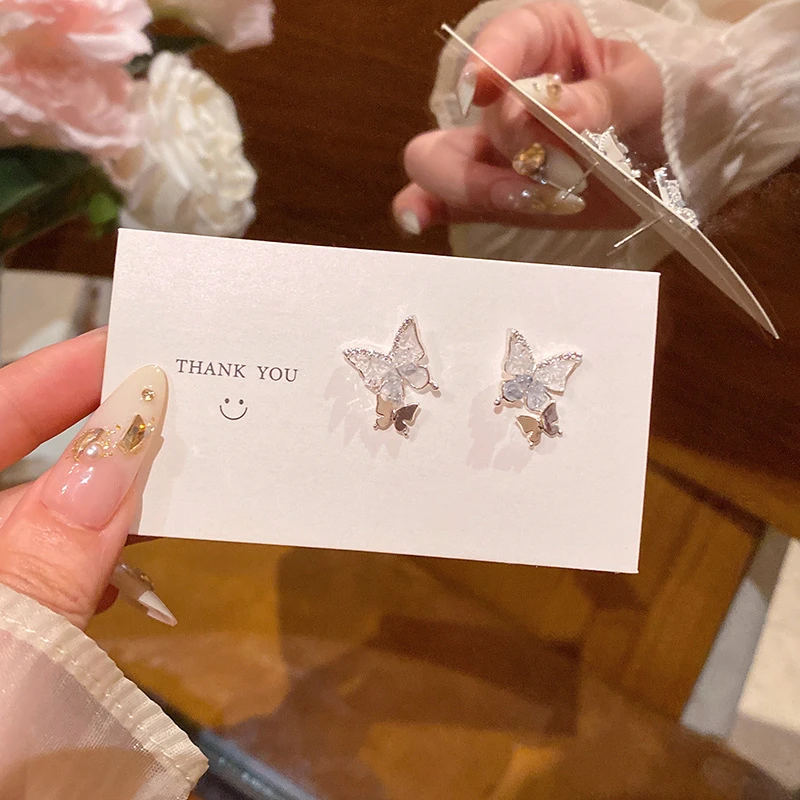 铜合金锆石耳饰 甜美气质蓝色碎蝴蝶耳钉女轻奢小众高级感星星吊