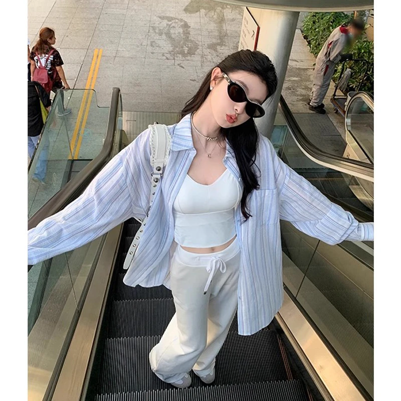 2025春季新款设计感蓝色条纹防晒衬衫女宽松休闲中长款防晒上衣服
