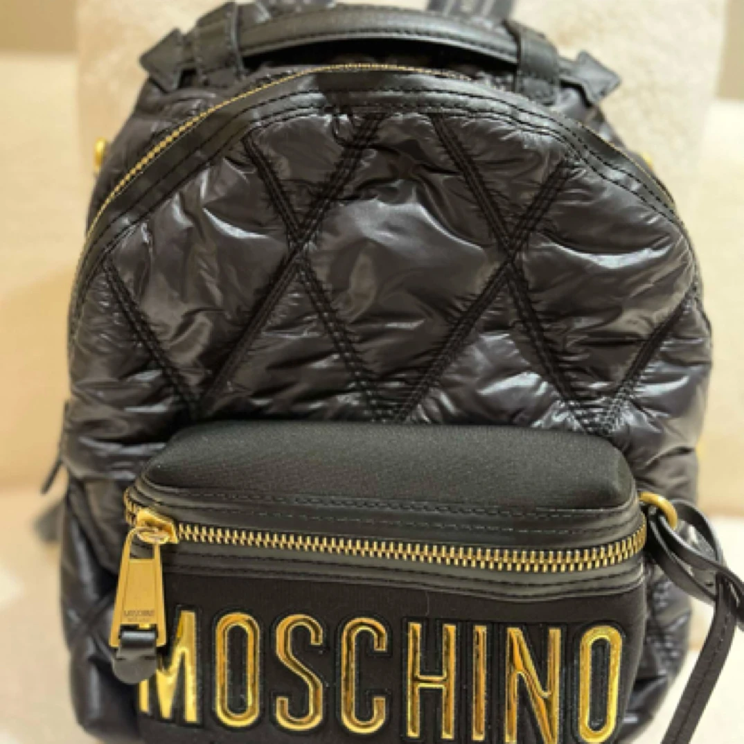 95新 Moschino/莫斯奇诺 双肩包/JW0534