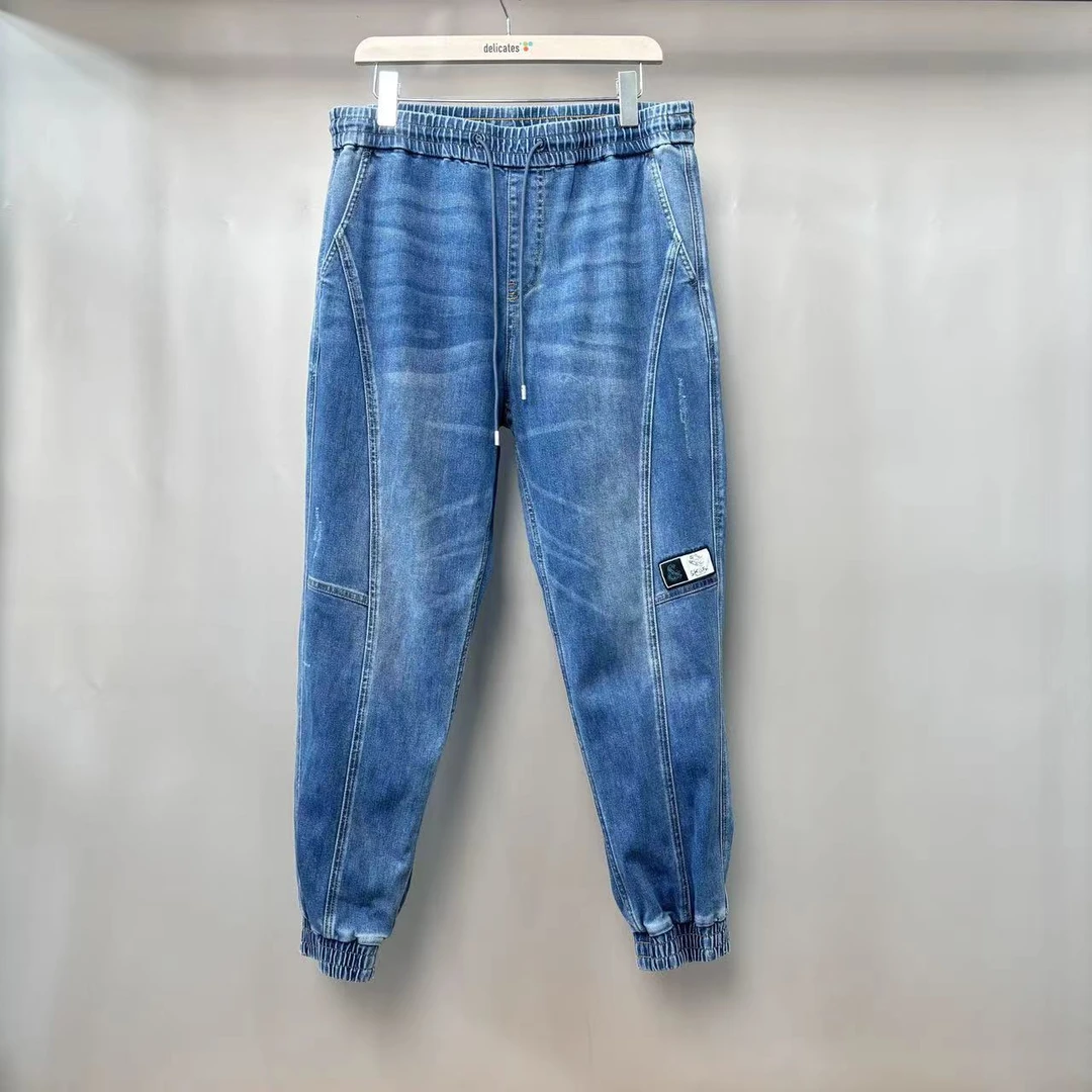 S-26 男士春秋薄款蓝色立裁拼接束脚牛仔裤  N0093