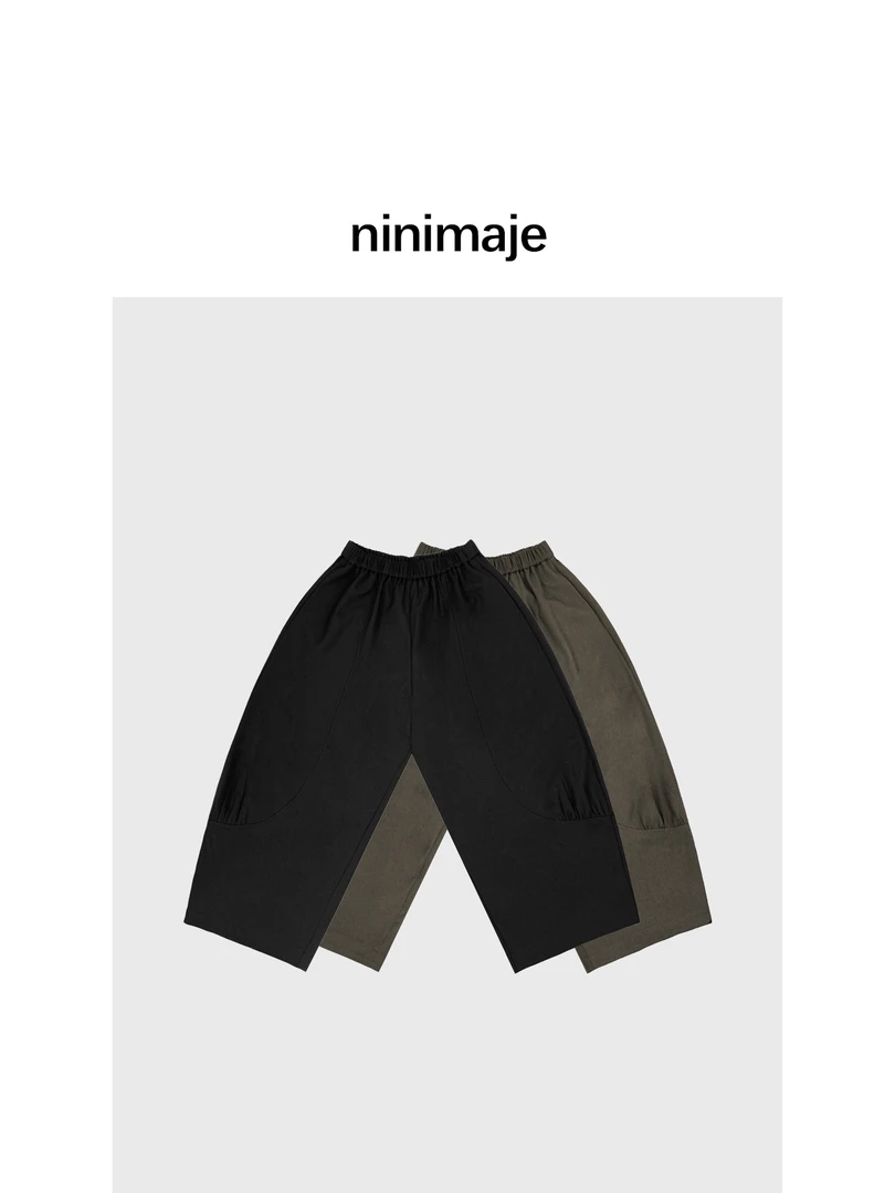 NanBeiBei 简约设计款百搭宽松捏褶结构主义片式剪裁裤 6176