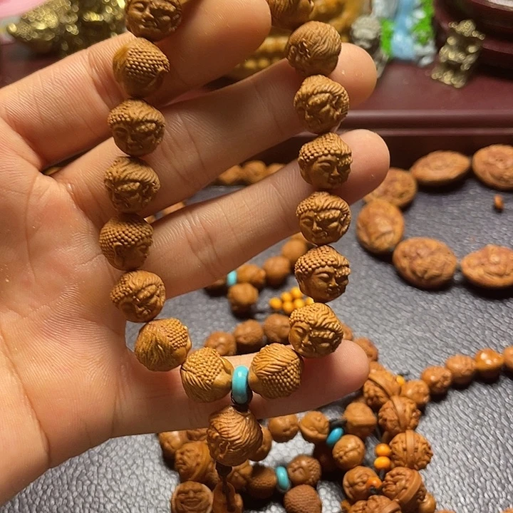龙纹桃核雕刻佛魔一念